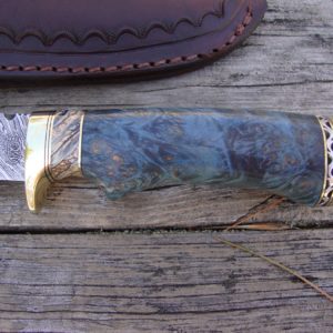 Tiger Damascus Blade with blue dyed maple burl and Mammoth Tooth handle File worked blade