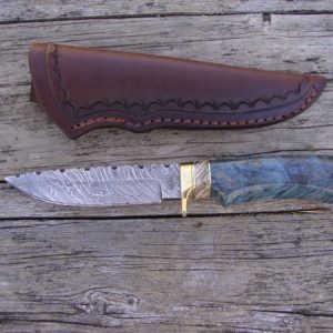 Tiger Damascus Blade with blue dyed maple burl and Mammoth Tooth handle File worked blade