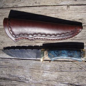 Tiger Damascus Blade with blue dyed maple burl and Mammoth Tooth handle File worked blade