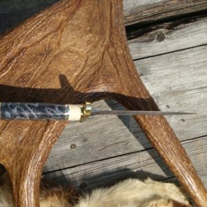 FOSSIL CORAL AND WARTHOG HANDLE DAMASCUS DAGGER