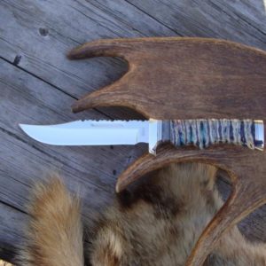 CUSTOMIZED BUCK 119 MAMMOTH TOOTH WITH CAPE BUFFALO HANDLE BOWIE