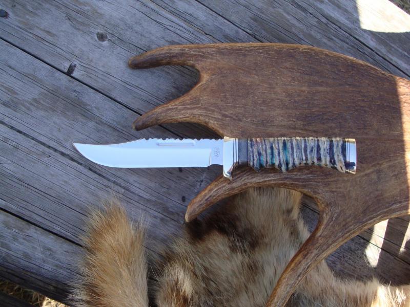 CUSTOMIZED BUCK 119 MAMMOTH TOOTH WITH CAPE BUFFALO HANDLE BOWIE