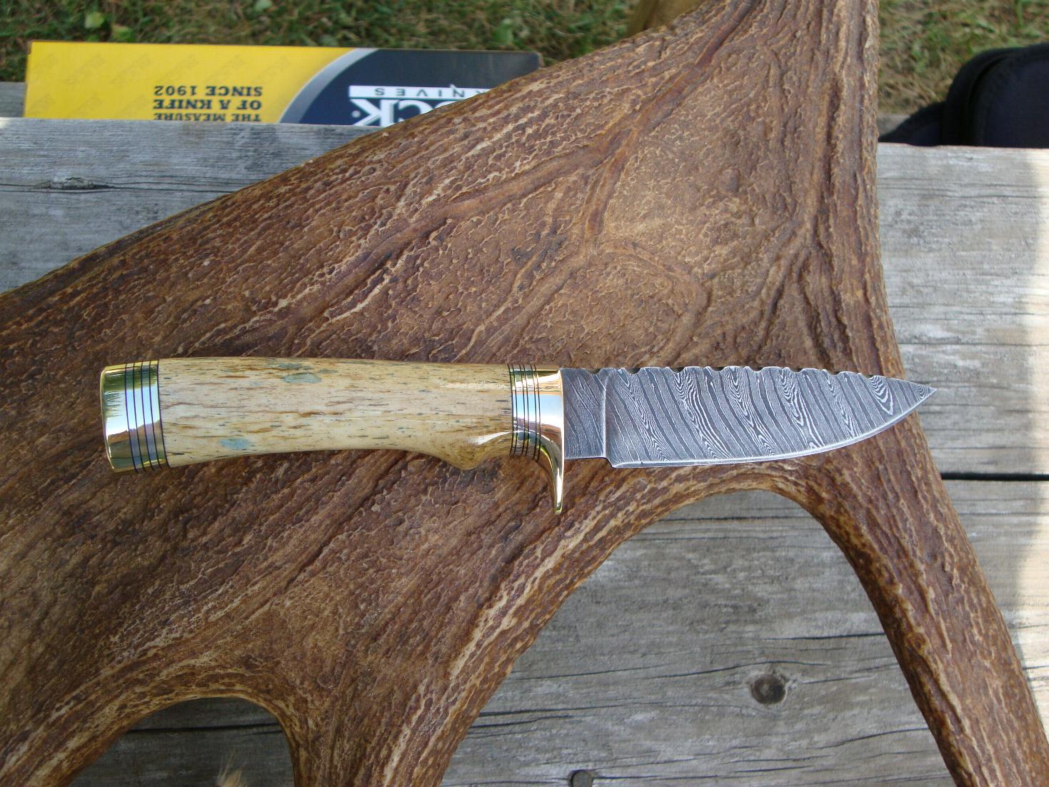 GIRAFFE BONE HANDLE TWIST DAMASCUS KNIFE