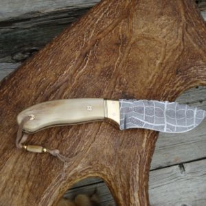 MAMMOTH IVORY HANDELS WITH SPIDER WEB DAMASCUS BLADE HUNTER FILE WORKED BLADE AND HANDLE