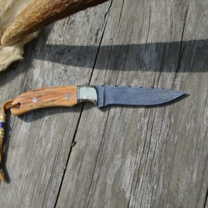 ORANGE GIRAFFE BONE HANDLE ZEBRA PATTERN DAMASCUS BLADE