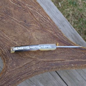 WHITE MOTHER OF PEARL ON BOTH ENDS WITH BLACK LIP MOTHER OF PEAR