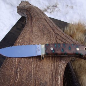 Loveless style tapered tang drop point with emerald green filled banksia pod handle