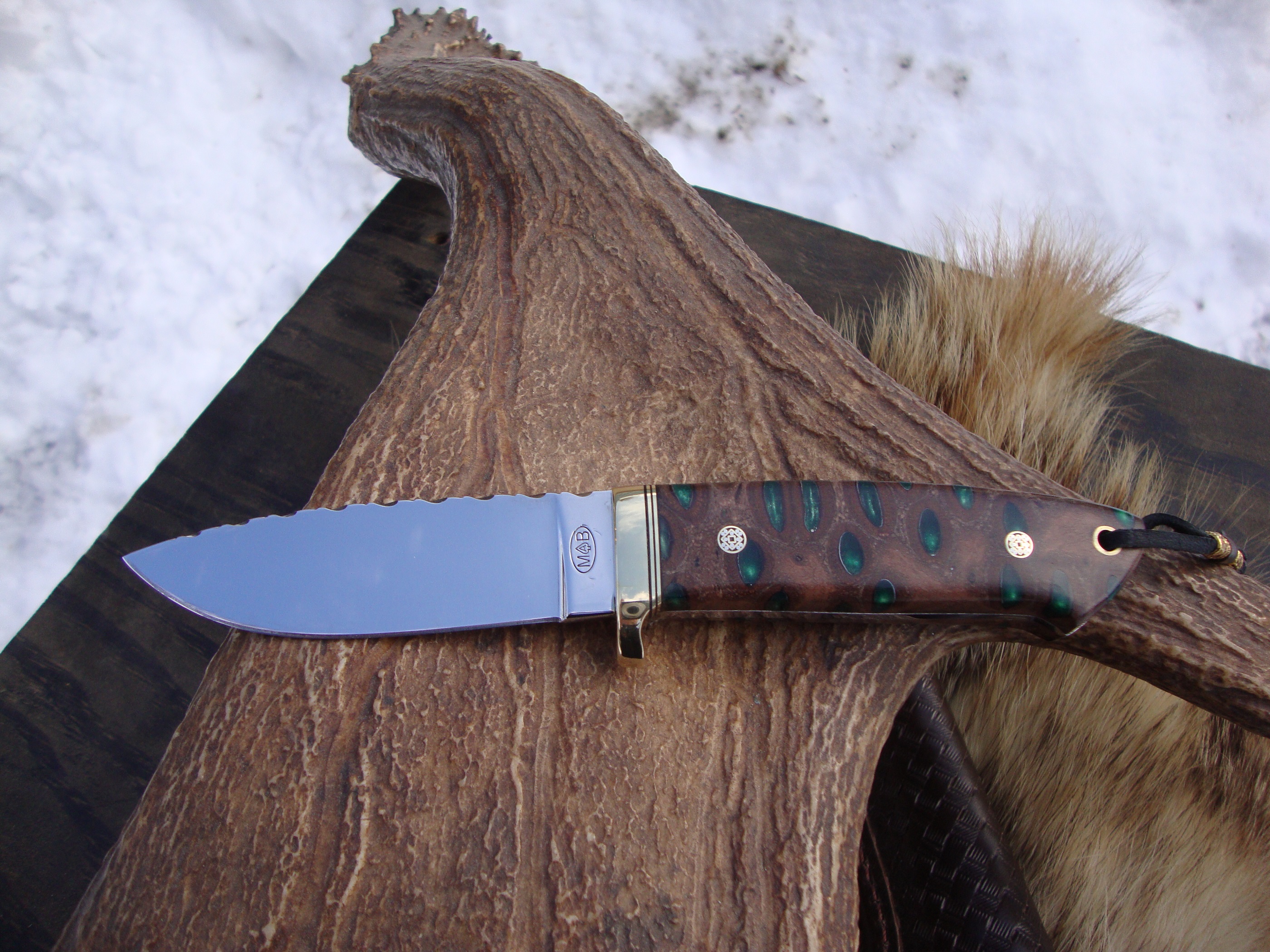 Loveless style tapered tang drop point with emerald green filled banksia pod handle