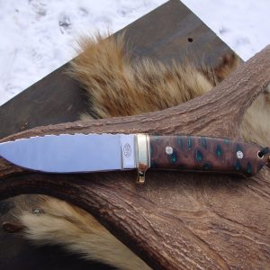 Loveless style tapered tang drop point with emerald green filled banksia pod handle