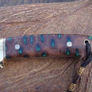 Loveless style tapered tang drop point with emerald green filled banksia pod handle