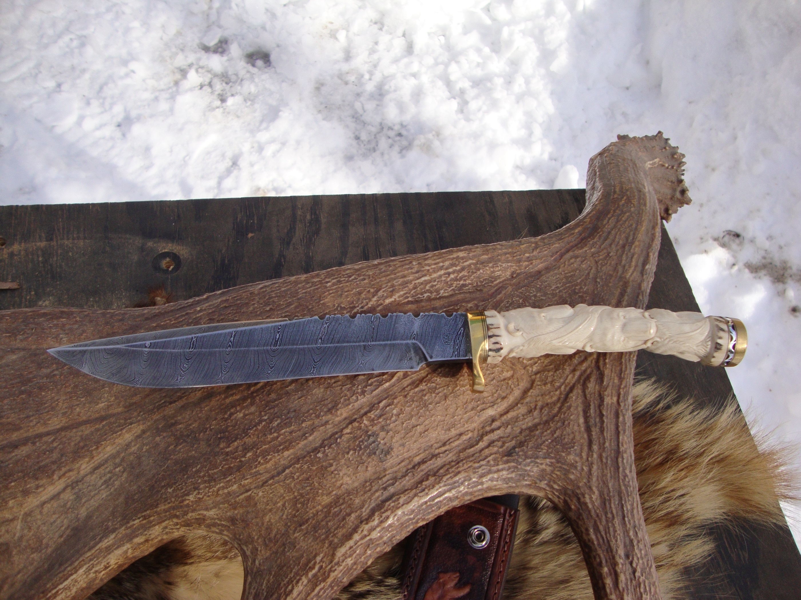 carved stag 6 bears twist pattern damascus bowie with file work