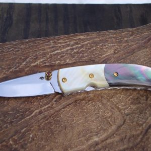 custom pocket knife with mother of pearl and black lip pearl