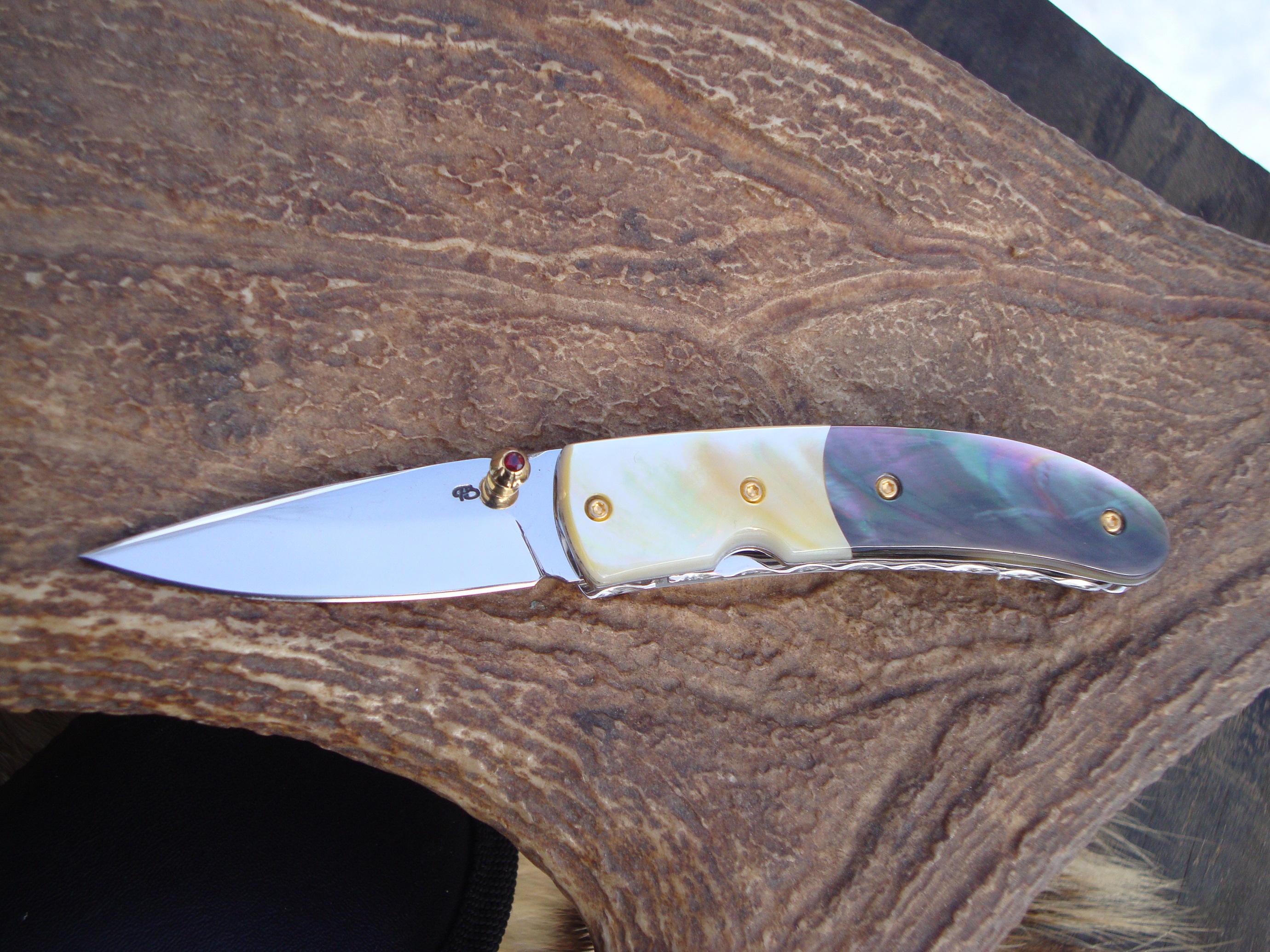 custom pocket knife with mother of pearl and black lip pearl