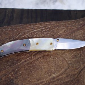 custom pocket knife with mother of pearl and black lip pearl