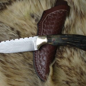 Feather Damascus blade with Yellow cedar burl wood handle