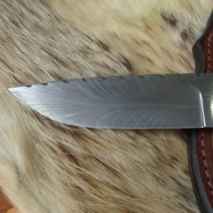 Feather Damascus blade with Yellow cedar burl wood handle